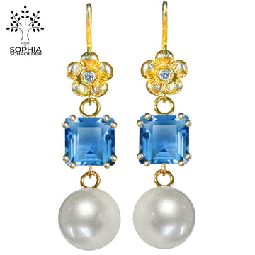 Lovechild ear rings with dangling stone and pearl